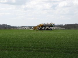 Crop spraying tractor