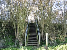 Steps up to the railway embankment