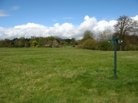 A rather isolated footpath sign